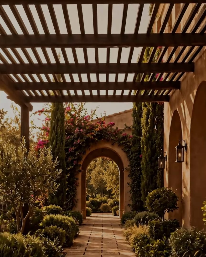 A garden walk under a long pergola